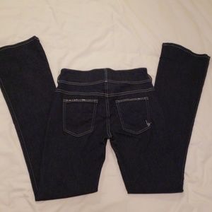 Bebe rhinestone studded pocket jeans